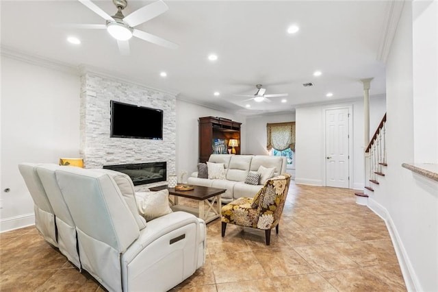 4917 Lake Vista Dr, Metairie, LA 70006 - living room featuring crown molding, a ceiling fan, recessed lighting, a fireplace, and stairs