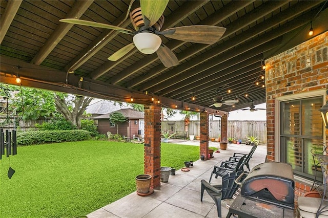 4917 Lake Vista Dr, Metairie, LA 70006 - fenced backyard featuring a ceiling fan and a patio