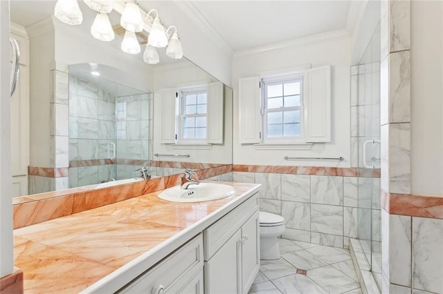 5018 St Charles Ave, New Orleans, LA 70115 - full bath with a shower stall, vanity, tile walls, a chandelier, and crown molding