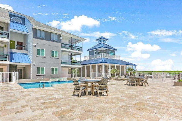 420 Metairie Hammond Hwy Unit 225, Metairie, LA 70005 - view of pool featuring outdoor dining area and a patio