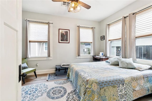 106 Rowley Blvd, La Place, LA 70068 - bedroom with wood finished floors and ceiling fan