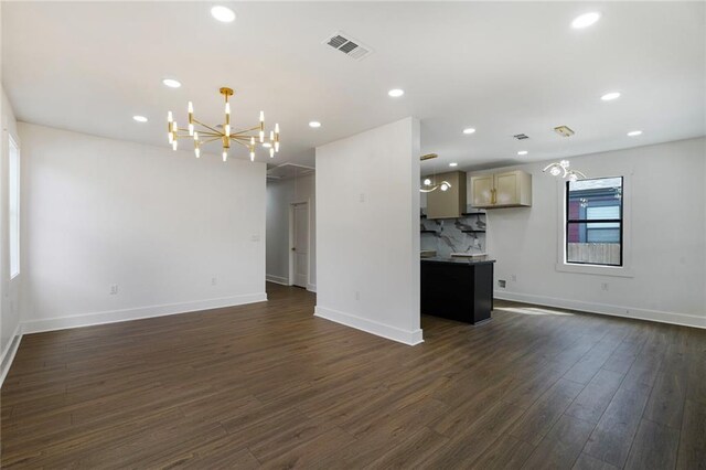 1721 Eagle St, New Orleans, LA 70118 - unfurnished living room featuring a chandelier, dark wood-type flooring, and recessed lighting