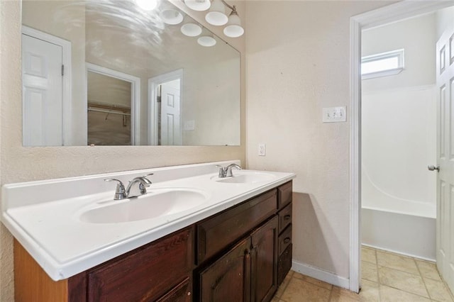 921 Jourdan Ave, New Orleans, LA 70117 - bathroom featuring double vanity and baseboards