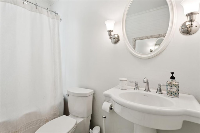 2027 Monroe St, Mandeville, LA 70448 - bathroom featuring toilet and a shower with shower curtain