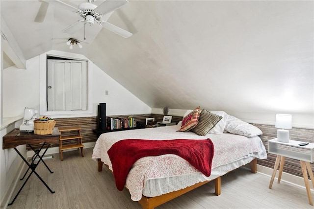 2027 Monroe St, Mandeville, LA 70448 - bedroom with wood finished floors, vaulted ceiling, and ceiling fan