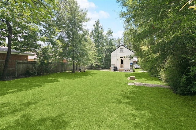 2027 Monroe St, Mandeville, LA 70448 - view of yard featuring entry steps and an outbuilding