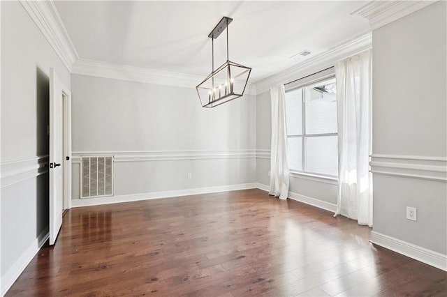 35 Elmwood Loop, Madisonville, LA 70447 - unfurnished dining area with crown molding, a chandelier, and dark wood-style flooring