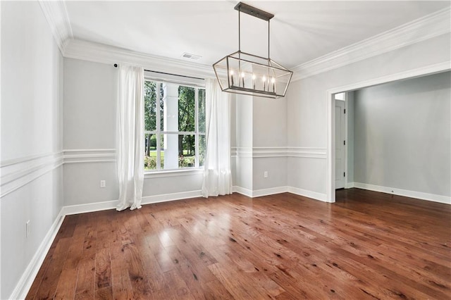 35 Elmwood Loop, Madisonville, LA 70447 - unfurnished dining area with a chandelier, crown molding, and hardwood / wood-style floors