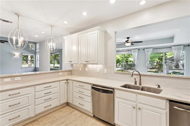 35 Elmwood Loop, Madisonville, LA 70447 - kitchen featuring dishwasher, a chandelier, recessed lighting, ceiling fan, and decorative backsplash