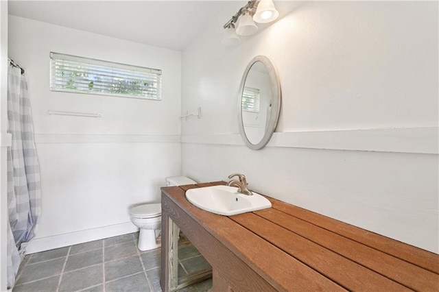 35 Elmwood Loop, Madisonville, LA 70447 - bathroom featuring vanity and curtained shower