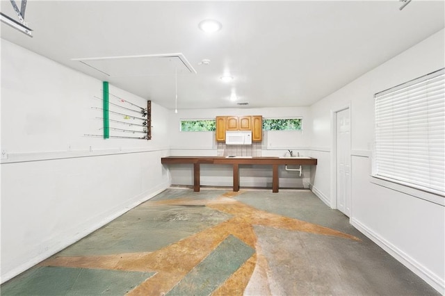 35 Elmwood Loop, Madisonville, LA 70447 - garage featuring baseboards and recessed lighting