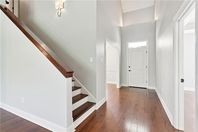 35 Elmwood Loop, Madisonville, LA 70447 - foyer entrance featuring hardwood / wood-style floors, stairway, and a high ceiling
