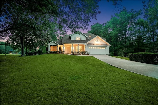 35 Elmwood Loop, Madisonville, LA 70447 - traditional home with a garage, a front yard, and concrete driveway
