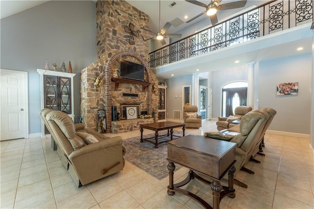 31 Allen Hill Rd, Tylertown, MS 39667 - tiled living area with a ceiling fan, high vaulted ceiling, a fireplace, and ornate columns