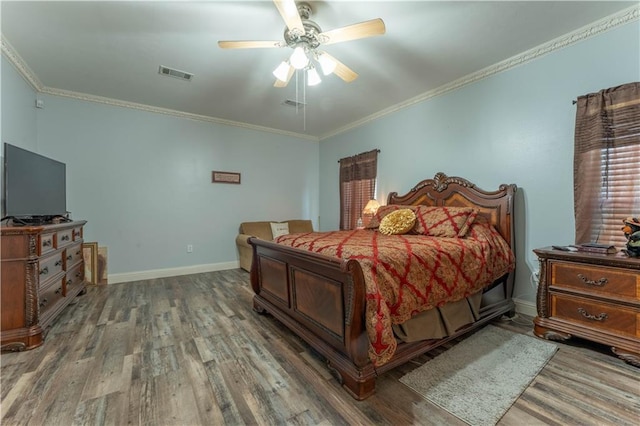 31 Allen Hill Rd, Tylertown, MS 39667 - bedroom with wood finished floors, crown molding, and a ceiling fan