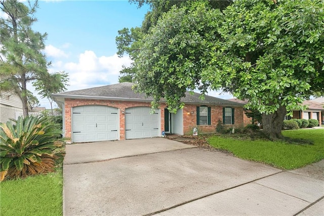 2041 Glencove Ln, Terrytown, LA 70056 - single story home featuring a garage, brick siding, concrete driveway, and a front lawn