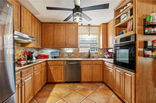2041 Glencove Ln, Terrytown, LA 70056 - kitchen with black appliances, under cabinet range hood, backsplash, ceiling fan, and a textured ceiling