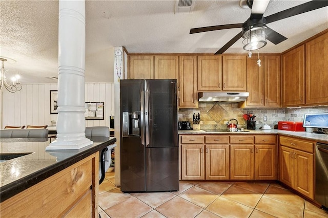2041 Glencove Ln, Terrytown, LA 70056 - kitchen with stainless steel appliances, decorative columns, under cabinet range hood, a ceiling fan, and a textured ceiling