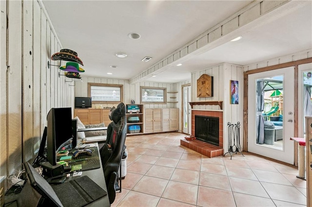 2041 Glencove Ln, Terrytown, LA 70056 - office area with light tile patterned floors and a brick fireplace
