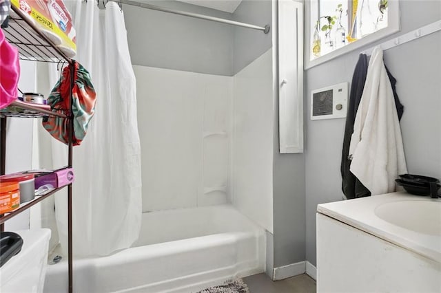222325 Felicity St, New Orleans, LA 70113 - bathroom featuring shower / bath combination with curtain and a sink