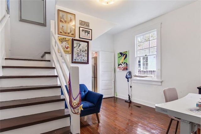 5227-29 Coliseum St, New Orleans, LA 70115 - stairway featuring wood-type flooring and baseboards
