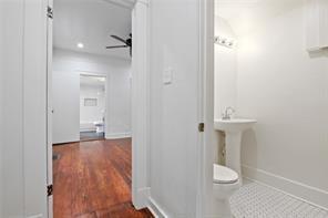5227-29 Coliseum St, New Orleans, LA 70115 - half bathroom featuring a ceiling fan, recessed lighting, and wood finished floors
