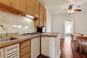 5227-29 Coliseum St, New Orleans, LA 70115 - kitchen featuring white appliances, a ceiling fan, and dark wood finished floors