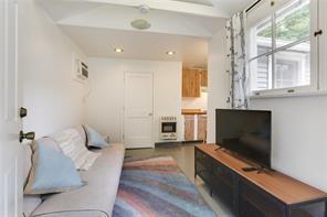 5227-29 Coliseum St, New Orleans, LA 70115 - living room featuring heating unit and recessed lighting