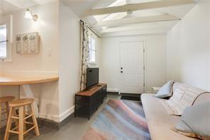 5227-29 Coliseum St, New Orleans, LA 70115 - entryway featuring plenty of natural light and beamed ceiling