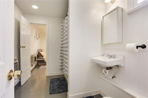 5227-29 Coliseum St, New Orleans, LA 70115 - full bath featuring recessed lighting and a shower with shower curtain