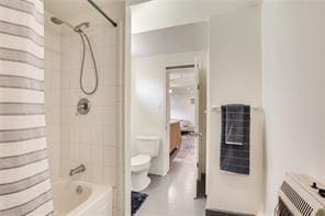 5227-29 Coliseum St, New Orleans, LA 70115 - full bathroom featuring heating unit and shower / bath combo