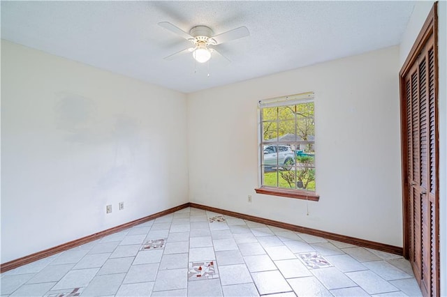 210 Lake Ontario Ct, Slidell, LA 70461 - unfurnished bedroom featuring a closet, a textured ceiling, and a ceiling fan