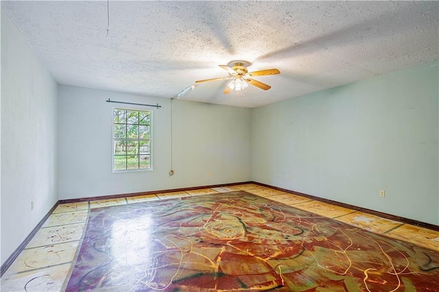 210 Lake Ontario Ct, Slidell, LA 70461 - spare room featuring ceiling fan and a textured ceiling