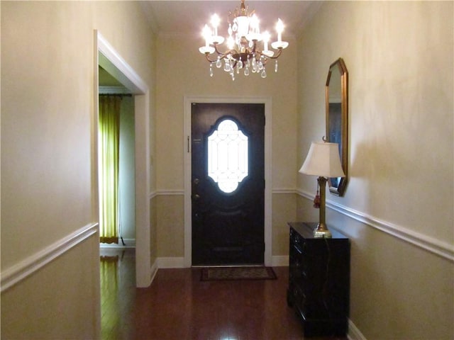 4908 Wills St, Metairie, LA 70006 - entryway with a chandelier, ornamental molding, and wood finished floors