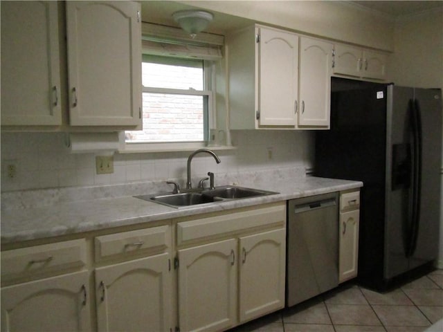 4908 Wills St, Metairie, LA 70006 - kitchen featuring dishwasher, black refrigerator with ice dispenser, light tile patterned flooring, tasteful backsplash, and ornamental molding