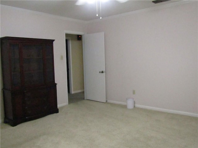4908 Wills St, Metairie, LA 70006 - unfurnished bedroom with light carpet, crown molding, and ceiling fan