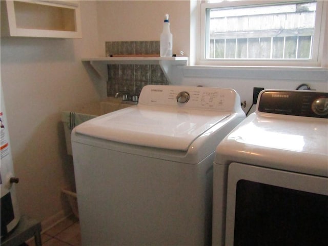 4908 Wills St, Metairie, LA 70006 - laundry area featuring independent washer and dryer