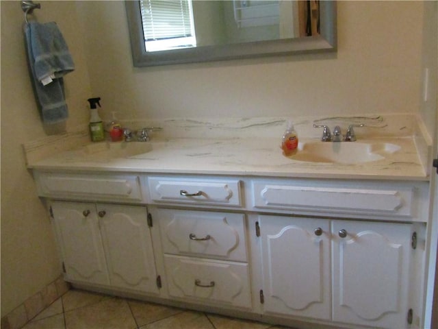 4908 Wills St, Metairie, LA 70006 - bathroom with double vanity and tile patterned floors