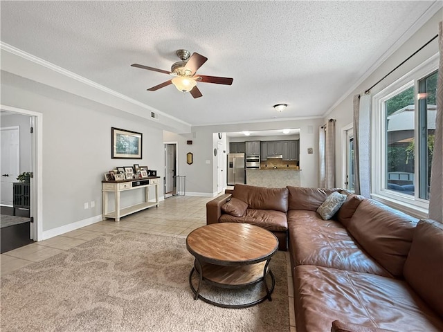 2009 Rubich Ln, Slidell, LA 70461 - living area featuring light tile patterned flooring, ceiling fan, a textured ceiling, and ornamental molding