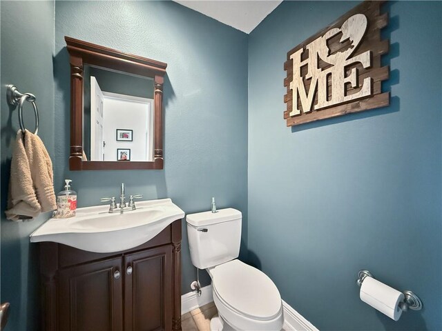 2009 Rubich Ln, Slidell, LA 70461 - half bathroom with vanity and toilet