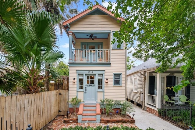 1016 Constantinople St, New Orleans, LA 70115 - view of front of home with a balcony, a ceiling fan, and driveway