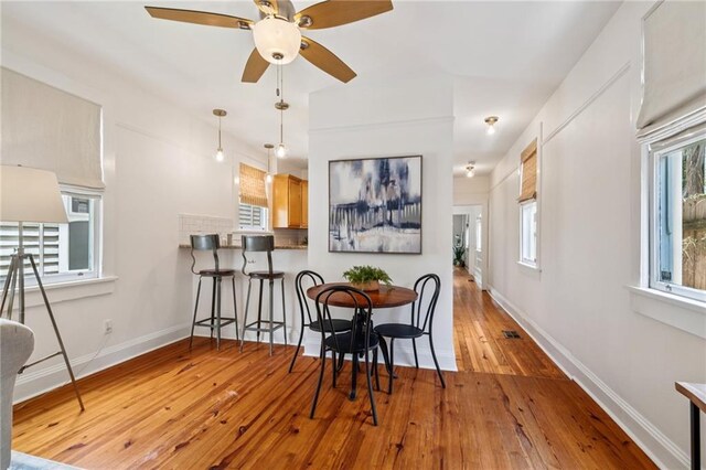 1016 Constantinople St, New Orleans, LA 70115 - dining area featuring wood-type flooring and a ceiling fan