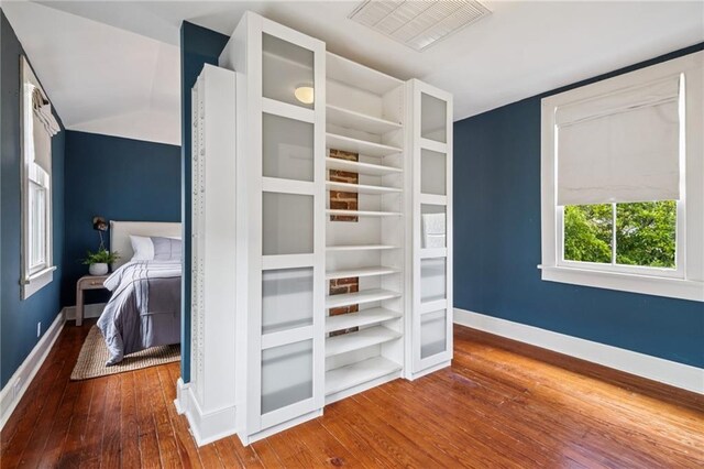 1016 Constantinople St, New Orleans, LA 70115 - unfurnished bedroom with wood-type flooring and baseboards