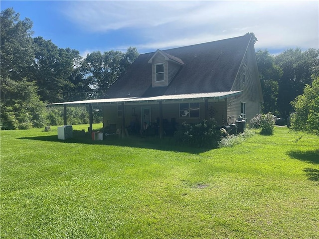 78028 N Fitzmorris Ext, Covington, LA 70435 - view of side of home with a lawn and a porch