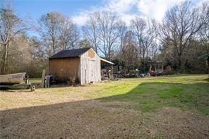 78028 N Fitzmorris Ext, Covington, LA 70435 - view of grassy yard featuring a storage shed
