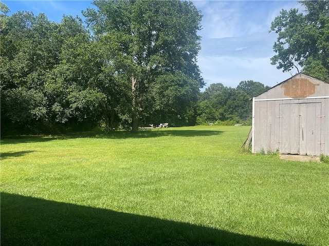 78028 N Fitzmorris Ext, Covington, LA 70435 - view of grassy yard with a shed