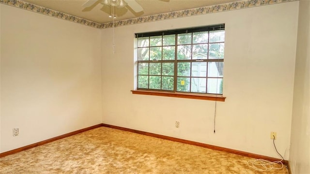232 Lake Village Blvd, Slidell, LA 70461 - carpeted spare room featuring a ceiling fan and baseboards