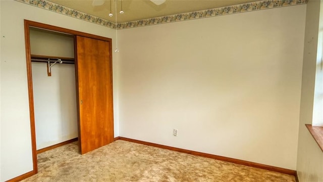 232 Lake Village Blvd, Slidell, LA 70461 - unfurnished bedroom with a closet, carpet, and a ceiling fan