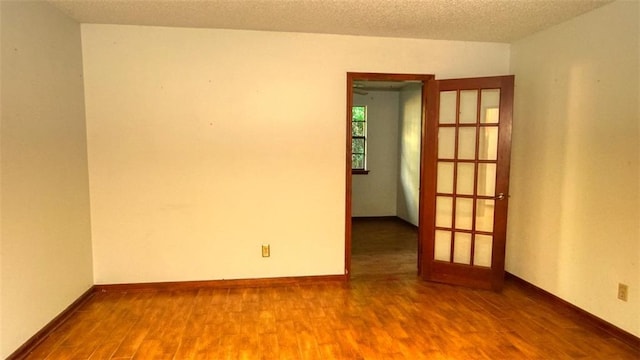 232 Lake Village Blvd, Slidell, LA 70461 - spare room with wood finished floors and french doors