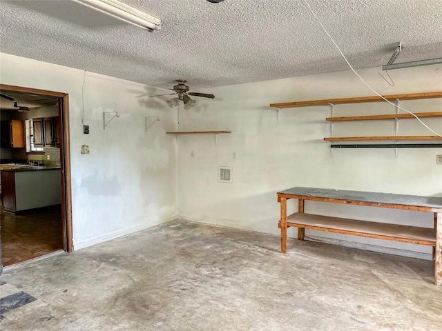 232 Lake Village Blvd, Slidell, LA 70461 - below grade area featuring a textured ceiling and a ceiling fan